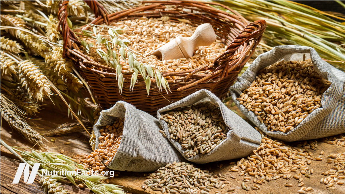 a basket and sacks filled with whole grains