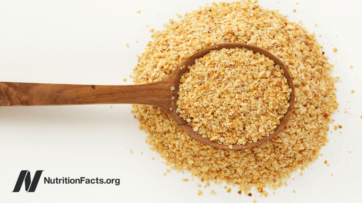 Wheat germ in a wooden spoon