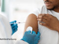 Patient receiving a vaccination from medical provider