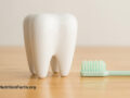 A tooth and a brush