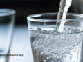 Water pouring into a glass