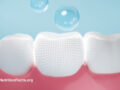 Digital drawing of teeth with water drops falling