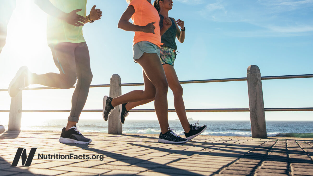 Group of runners on a boardwalk