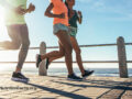 Group of runners on a boardwalk