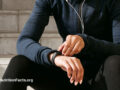 Woman checking her fitness tracker on her wrist