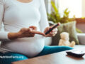 Diabetic pregnant person using a blood glucose meter