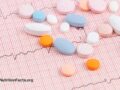 Closeup of various tablets on top of graph paper