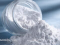Powdered titanium dioxide spilling from a jar
