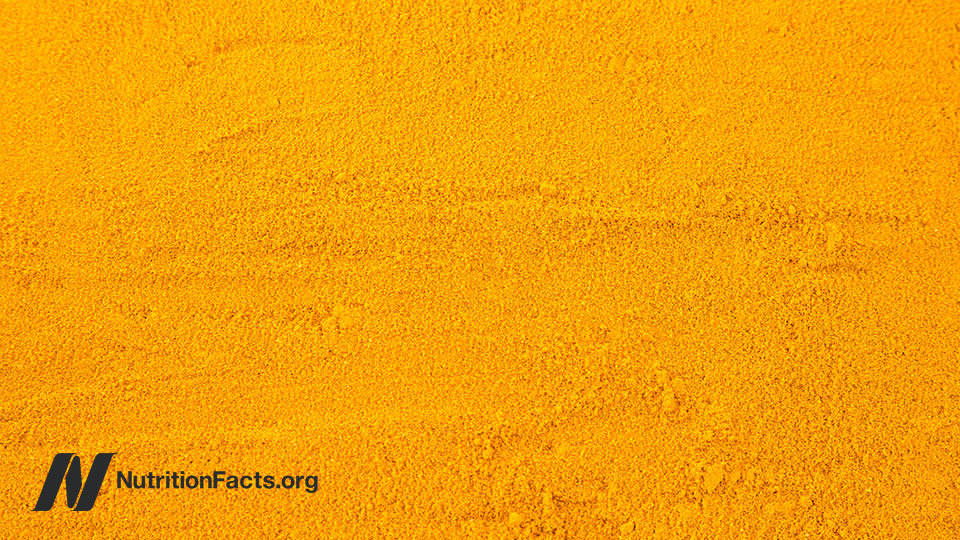 Overhead view of powdered turmeric
